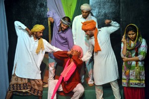 A scene from the play 'Ek Hi Mitti Ke Poot' presented by Natrang in its weekly series 'Sunday Theatre'.