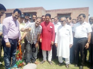 Speaker, Kavinder Gupta laying foundation of tubewell at Greater Kailash.