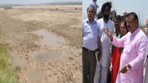 Minister for Commerce Chander Parkash Ganga inspecting flood protection measures at Samba on Saturday.