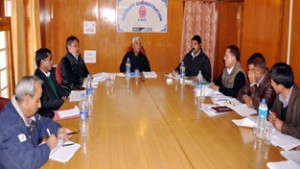 Member Parliament Thupstan Chhewang chairing meeting of DEC at Leh on Monday.