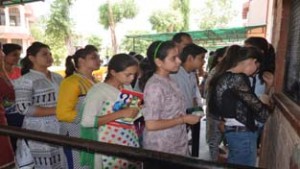 College admission seekers standing in queue for purchasing brouchers on Friday.