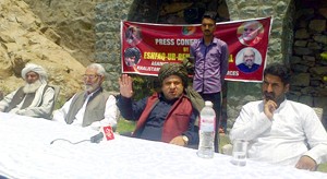 BJP leader Eshfaq-ur-Rehman Poswal addressing press conference on Sunday.