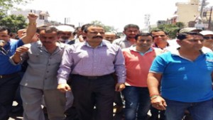 JKNPP President Balwant Singh Mankotia leading a protest at Udhampur on Thursday.