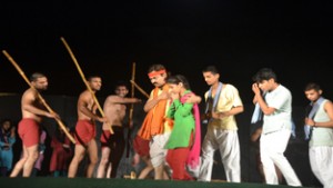 A scene from the globally acclaimed Dogri play 'Bawa Jitto' directed by Balwant Thakur, presented at Aghar Jitto Mela-2015.