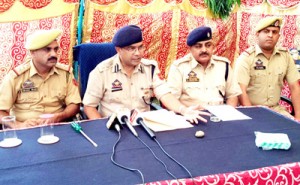 SSP Jammu Uttam Chand interacting with media persons at Jammu on Tuesday. SDPO East Mohammad Rafiq Manhas & SHO Channi Himmat Inspector Aejaz Wani are also seen in picture.        -Excelsior/Rakesh