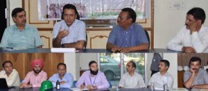 Minister for CAPD, Choudhary Zulfkar Ali chairing a meeting at Jammu on Friday.
