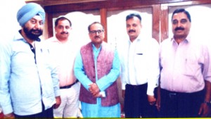 Delegation of Contractor Association of Estates Division during their meeting with Deputy Chief Minister Dr Nirmal Singh on Saturday.