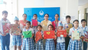  Winners of Folder Making Competition posing for a group photograph at Jammu Sanskriti School on Thursday.