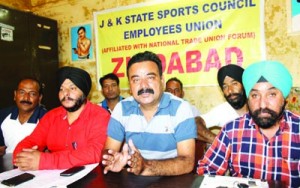  Vikramjeet Singh, president J&KSSCEU and Rajinder Kumar, vice president J&KNTUF addressing media persons in Jammu on Sunday.