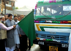 Transport Minister Abdul Gani Kohli flagging of Srinagar-Poonch Rajouri bus service.