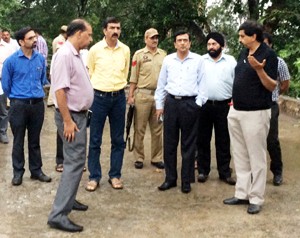 MoS Pawan Gupta alongwith senior officers inspecting development works at Udhampur on Tuesday.