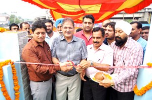 Speaker Kavinder Gupta alongwith MLA Rajesh Gupta and JMC Commissioner Soujanya Sharma inaugurating a Toilet Complex at Nawabad on Wednesday.