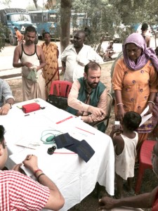 HoD Cardiology Dr Sushil Sharma examining a child patient.