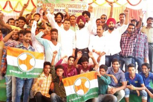 PYC activists raising slogans against BJP-PDP Govt at Bishnah on Sunday. 