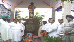 Cong leaders paying tributes to Kargil war hero at a function in Ramnagar on Monday.