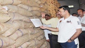 Minister for CAPD and Tribal Affairs Choudhary Zulfkar Ali inspecting godown of FCI on Tuesday.