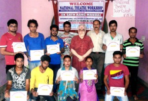 Participants of National Theatre Workshop of ESRM posing along with certificates at Jammu on Monday.