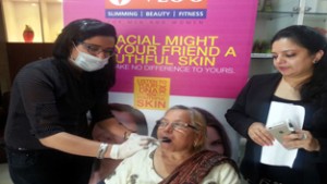 VLCC officials performing DNA Skin programme on a customer.