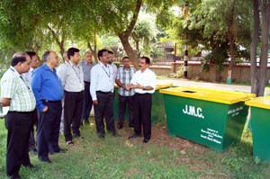 D Sethi, Regional Director, Reserve Bank of India during handing over waste containers to Jammu Municipal Corporation on Wednesday.