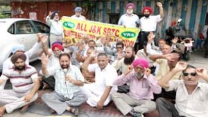 VRS given SRTC workers staging protest demonstration on Wednesday. —Excelsior/ Rakesh