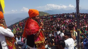 MLA Ramban Neelam Langeh addressing yatris of Chamunda Mata. 