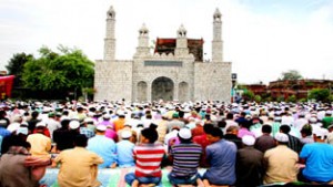 Muslims offering Eid prayers at Eidgah Jammu on Saturday. -Excelsior/Rakesh