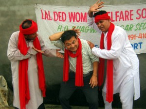 A scene from the play ‘Mitti Ka Madhow’ staged by Lalded Women Welfare Society at Gangyal in Jammu.