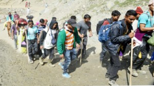 Amarnath yatris on their way to holy cave on Thursday.