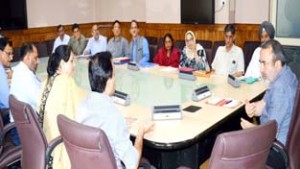 Chief Secretary, Iqbal Khandey chairing a meeting at Srinagar on Tuesday.