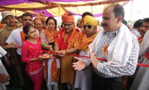 DyCM inaugurating 19th Bhandara of Jai Baba Neelkanth Sewa Mandal on Sunday. 