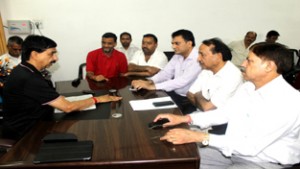 Members of Hotel and Restaurant Association interacting with MoS Finance Pawan Gupta.