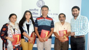 Prominent national artists posing with Balwant Thakur at Jammu on Wednesday. 