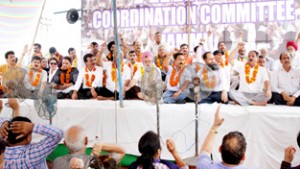 Members of AIIMS Coordination Committee and civil society protesting at Jammu on Sunday. -Excelsior/Rakesh