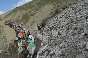 Yatris on way to holy cave of Swami Amarnath on Tuesday. — Excelsior/Sajad Dar