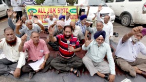 VRS given SRTC workers staging protest demonstration in Jammu on Monday. — Excelsior/ Rakesh