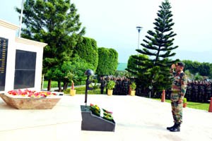 GOC Uniform Force paying homage to martyrs at War Memorial during function at Reasi on Wednesday.