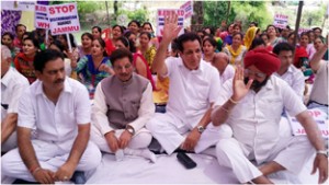 Students & FORCE members sitting on protest dharna near DC office at Kathua on Thursday.