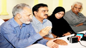 Jammu & Kashmir Coordination Committee of Private Schools Association (CCPSA) president Ghulam Nabi Var with senior members addressing a press conference in Srinagar on Monday.                   -Excelsior/Amin War