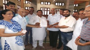 Sat Sharma, MLA Jammu West contributing Rs 5 lakh to Arya Samaj Mandir during a function on Friday.