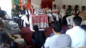 Ashok Koul interacting with party activists at Budgam on Saturday.