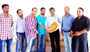 Office bearers of Sangarsh submitting newsletter to MLC Vibodh Gupta at Rajouri.