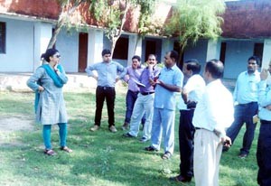 Director School Education Yasha Mudgal interacting with staff of a school in Basohli tehsil on Tuesday.