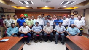 Powergrid employees felicitated by Executive Director in Jammu on Friday.