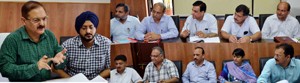 Divisional Commissioner Pawan Kotwal chairing a meeting at Jammu on Thursday. 