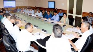 Minister for Cooperative Chering Dorjay chairing a meeting at Srinagar on Thursday.