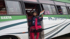 A bus carrying girl students for educational tour being organized by Indian Army.