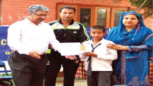 Winner of Cross Country being felicitated at GBHS, Natipora in Srinagar on Monday.