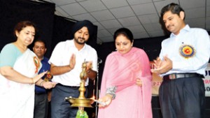 Minister of State for Information, Education and Culture, Priya Sethi lighting ceremonial lamp while inaugurating  cultural Programme on Monday.