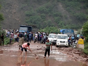 Road clearance work in progress at Kheri near Udhampur on Jammu-Srinagar National Highway.