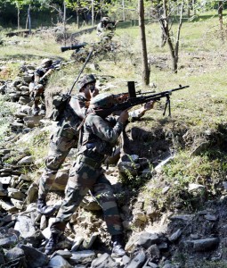 Troops in action during encounter at Qazinag forests of Uri on Wednesday.— Excelsior/Aabid Nabi